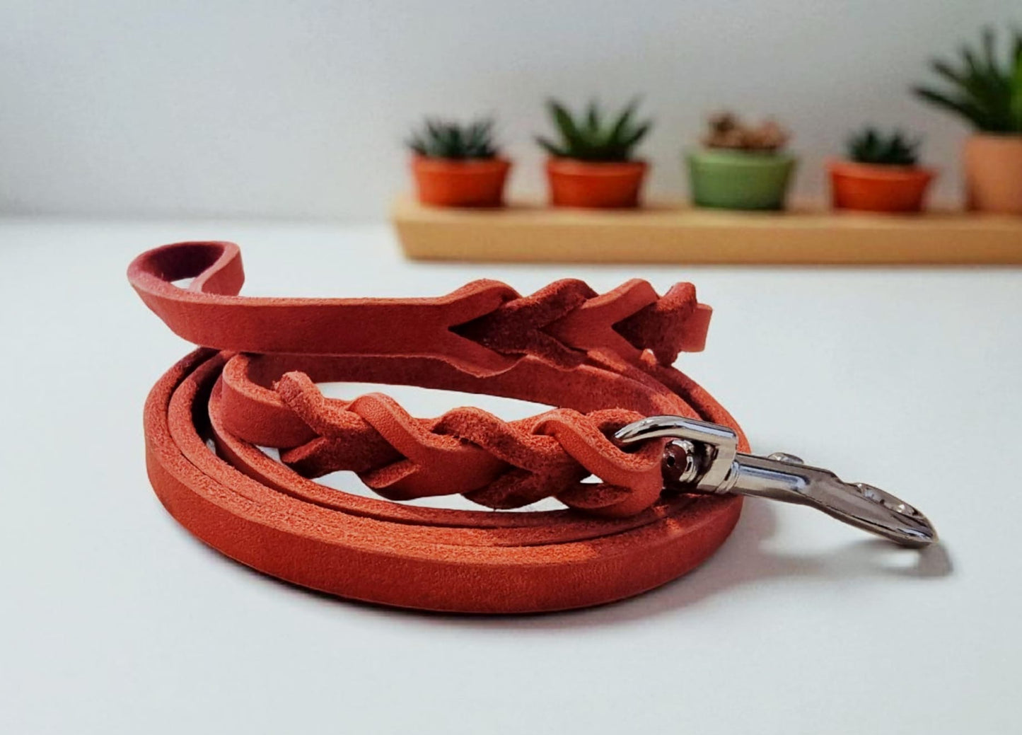 Gray leather leash with black fittings