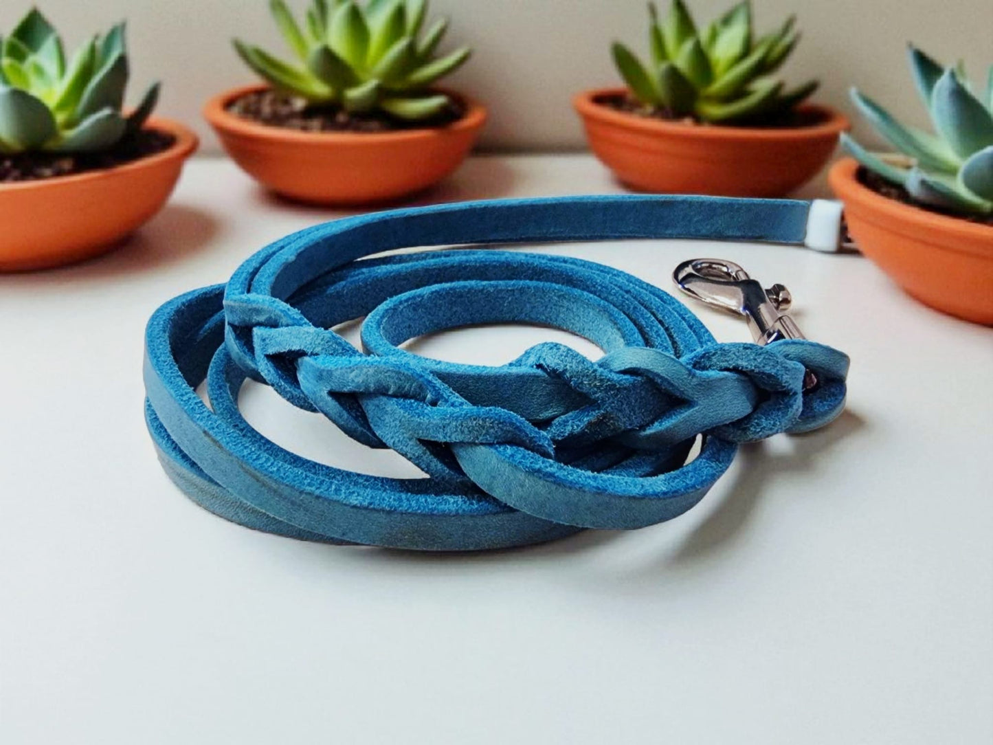 Gray leather leash with black fittings