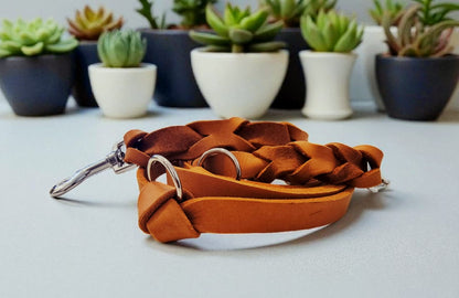 Gray leather leash with black fittings